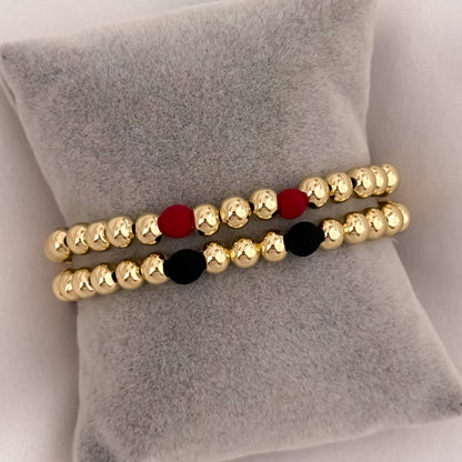 Promoción de Pulseras  para Parejas en Balin de 6mm Liso con neopreno Rojo o Negro en Oro Laminado 18k con Garantia de por vida