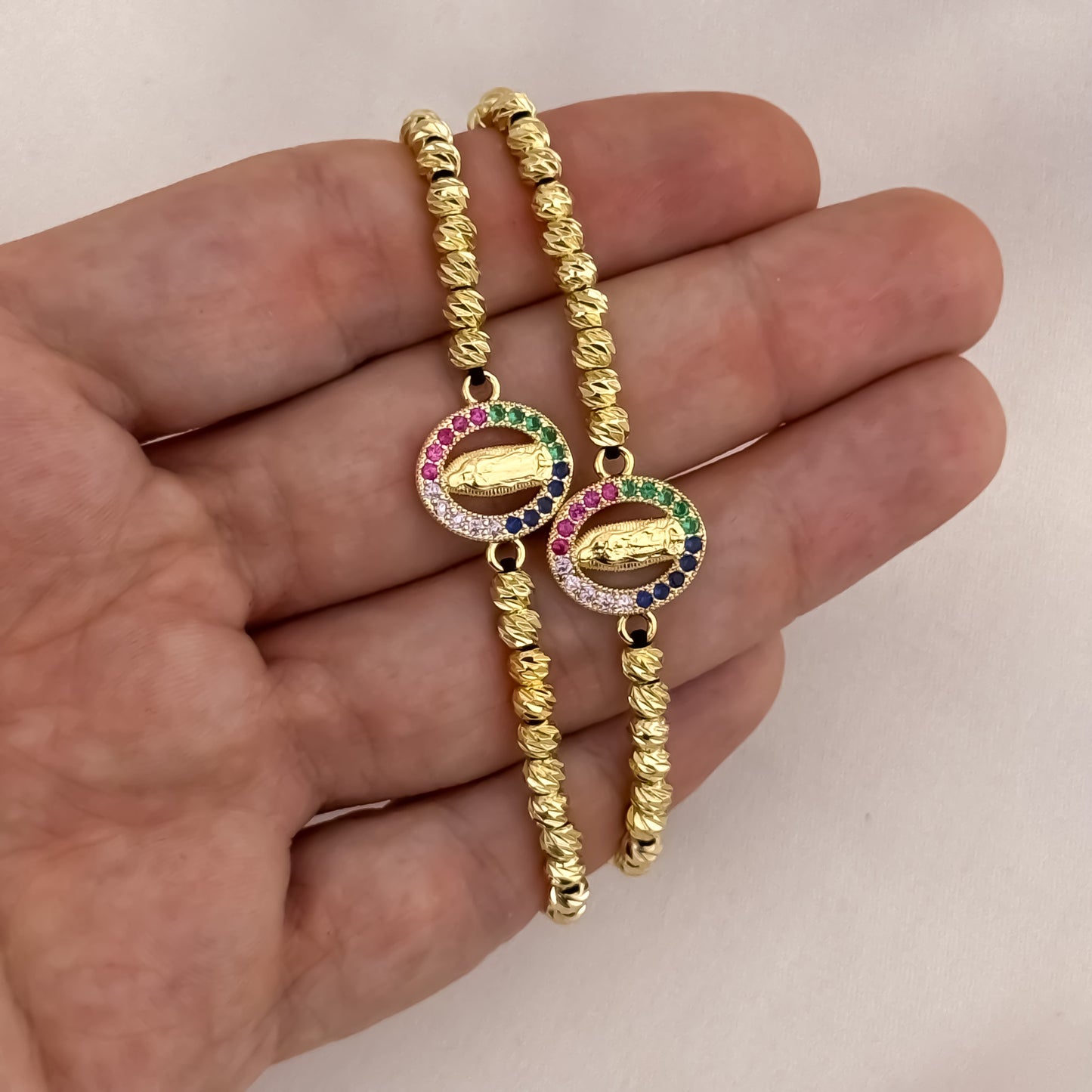 Promoción de 2 Pulseras Para Parejas de Virgen Guadalupe con Micro Circones de Colores  en Balin italiano de 6mm en Oro Laminado 18k