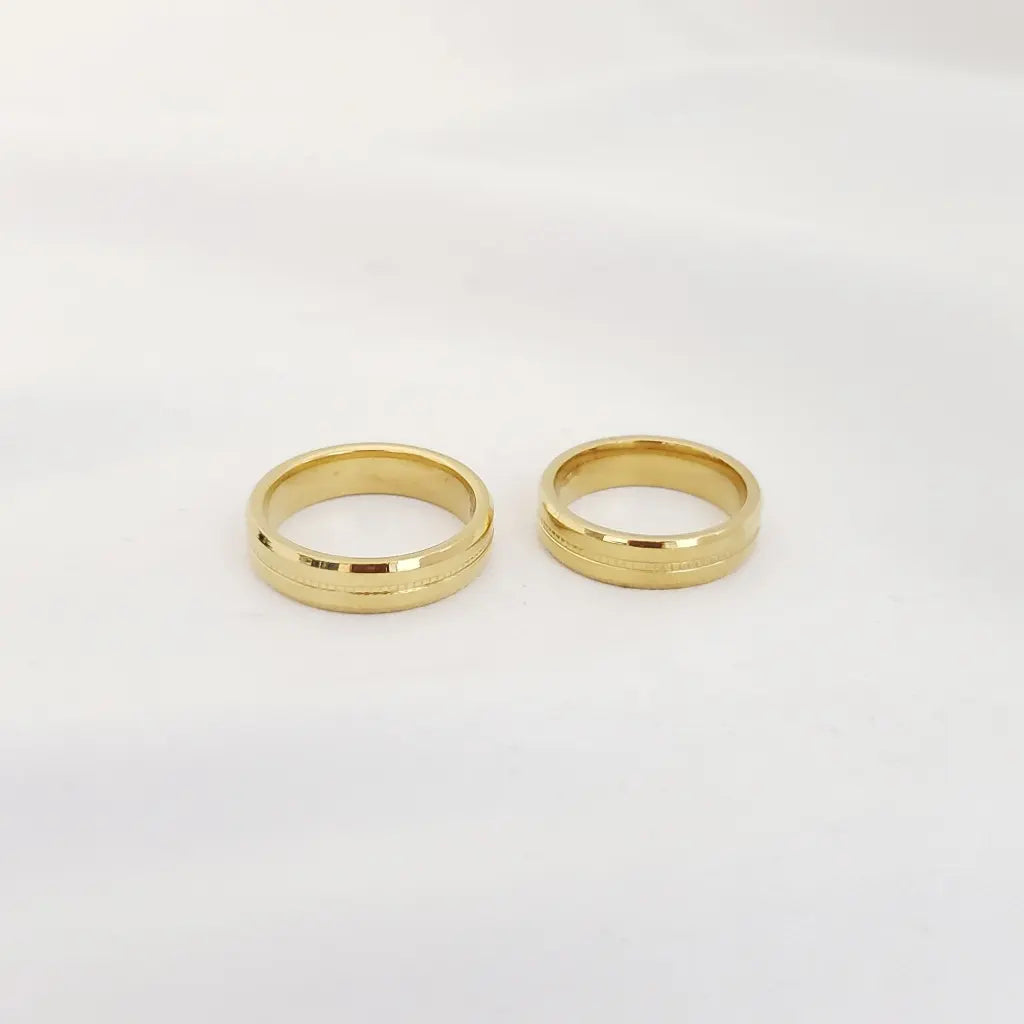 Par De Argollas De Matrimonio De Diseño De Una Línea Con Marcado